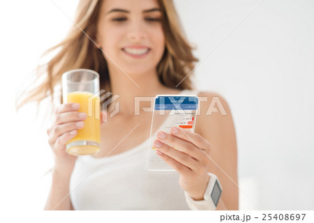 Joyful woman using cell phone Joyful woman using cell phone 25408697