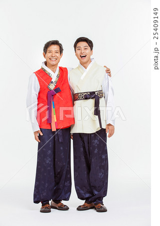 Asian Three Generation Family in Hanbok, Korean Traditional Clothes Asian Three Generation Family in Hanbok, Korean Traditional Clothes 25409149