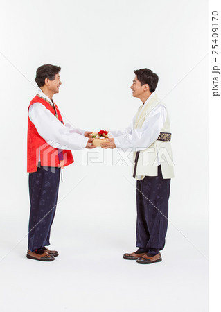 Asian Three Generation Family in Hanbok, Korean Traditional Clothes Asian Three Generation Family in Hanbok, Korean Traditional Clothes 25409170