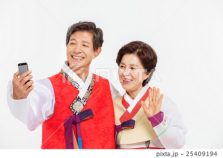 Asian Three Generation Family in Hanbok, Korean Traditional Clothes Asian Three Generation Family in Hanbok, Korean Traditional Clothes 25409194