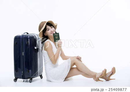 A young woman excited for vacation A young woman excited for vacation 25409877