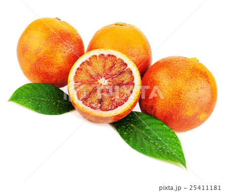 Ripe red blood oranges with cut and green leaves  25411181