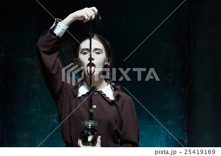 The Halloween theme: crazy girl with snakes 25419169