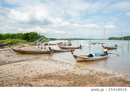 Fishing boats parking at mangrove beach Fishing boats parking at mangrove beach 25419419
