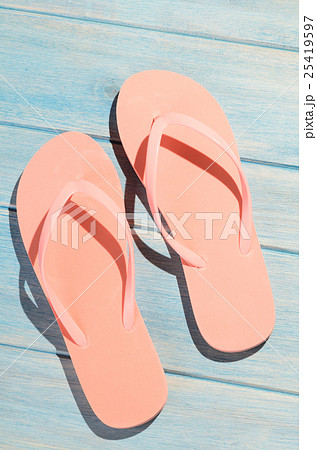 flip flops on table 25419597
