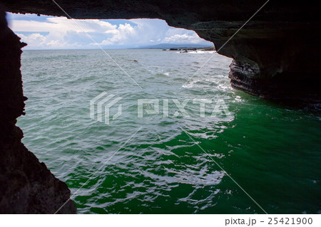 sea view through cove in rocks sea view through cove in rocks 25421900