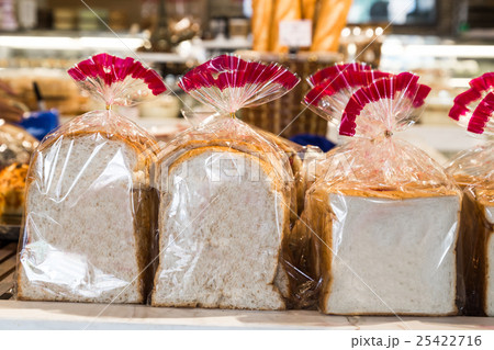 Organic gluten free bread in plastic wrapper 25422716