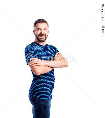 Hipster man in blue striped t-shirt, studio shot Hipster man in blue striped t-shirt, studio shot 25425598