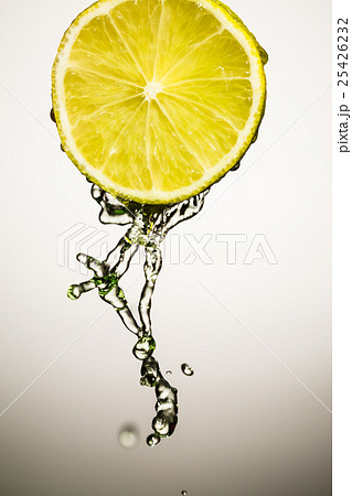 One half of lime with stream  fresh water isolated 25426232