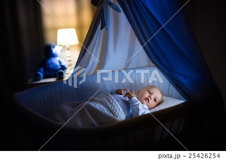 Baby boy sleeping at night 25426254