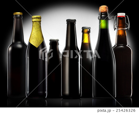 Set of beer bottles isolated on black background Set of beer bottles isolated on black background 25426326