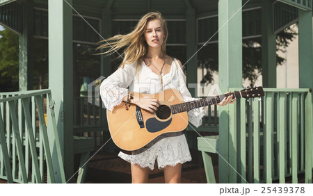 Guitar Girl Relaxation Casual Instrument Leisure Concept Guitar Girl Relaxation Casual Instrument Leisure Concept 25439378