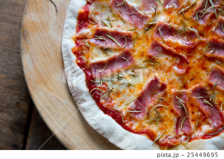 pizza italian style on the wood plate pizza italian style on the wood plate 25449695