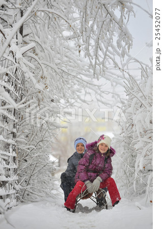 Happy children sliding 25452077