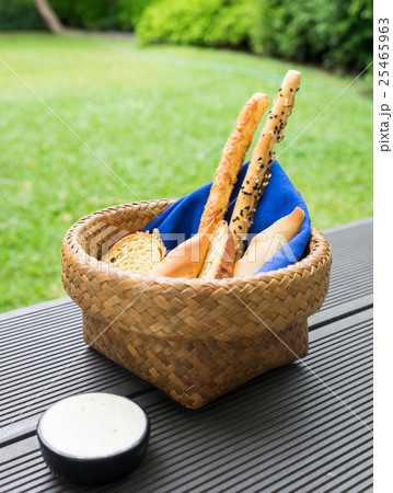 Bread loaf food snack in basket with blue napkin Bread loaf food snack in basket with blue napkin 25465963