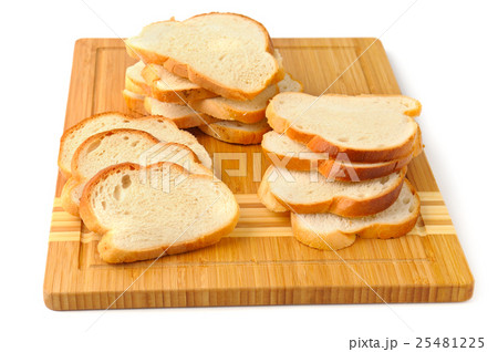 cut bread on breadboard 25481225