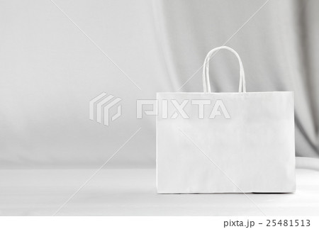 Paper bag on white 25481513