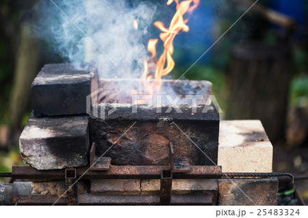 flame in outdoor rural brick forging furnace 25483324