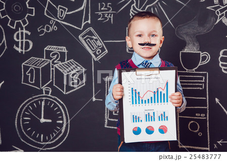 Little boy as a businessman with mustache shows Little boy as a businessman with mustache shows 25483777