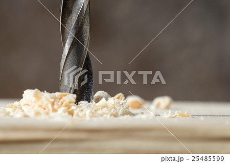 Drill with sawdust 25485599