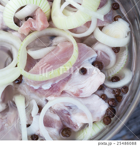 Marinating meats, pork, onion and pepper Marinating meats, pork, onion and pepper 25486088