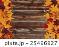 maple leaves and wooden background 25496927