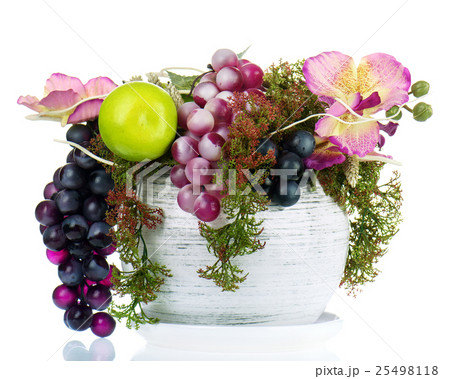 Colorful composition made of artificial flowers and fruits in vase isolated. Colorful composition made of artificial flowers and fruits in vase isolated. 25498118