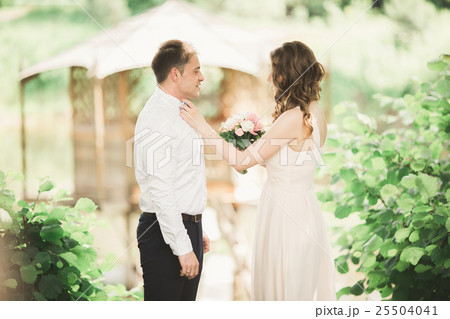 Lovely couple in love kissing each other on the Lovely couple in love kissing each other on the 25504041