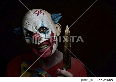 scary evil clown with a knife scary evil clown with a knife 25504669
