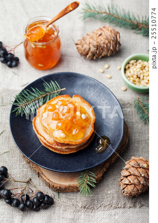 Christmas winter pancakes with pear, tangerine jam Christmas winter pancakes with pear, tangerine jam 25510774