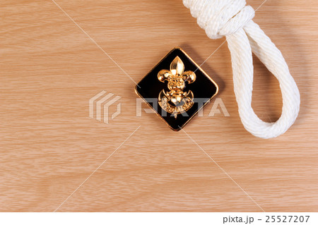Orderliness white scout rope with boy scout symbol Orderliness white scout rope with boy scout symbol 25527207