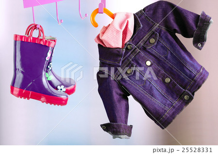rubber boots for kids hanging with jeans jacket 25528331