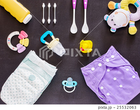 Flat lay of baby set with cloth diaper 25532063