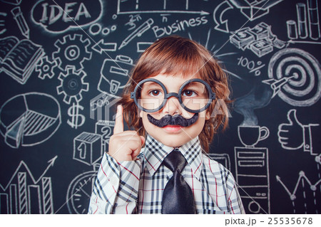 Little boy as businessman or teacher with mustache 25535678