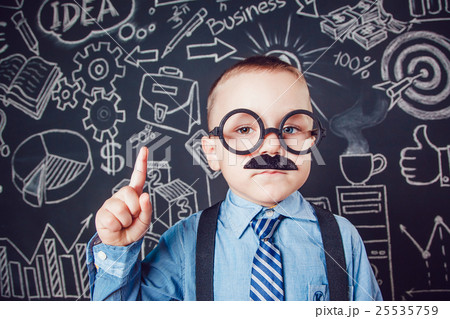 Little boy as businessman or teacher with mustache 25535759