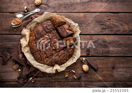chocolate brownie on dark wooden background chocolate brownie on dark wooden background 25552505