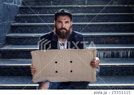 Vagrant with cardboard 25553115