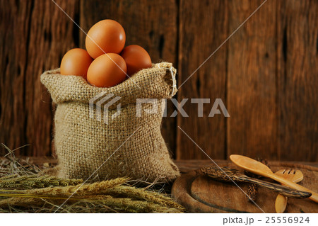 Fresh eggs on wooden background from farm Fresh eggs on wooden background from farm 25556924