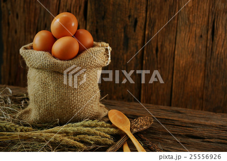Fresh eggs on wooden background from farm Fresh eggs on wooden background from farm 25556926