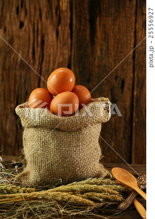 Fresh eggs on wooden background from farm Fresh eggs on wooden background from farm 25556927