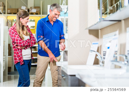Shop assistant in hardware store  25564569