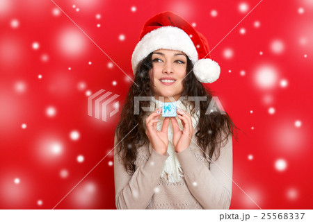 girl in santa hat portrait, christmas holiday 25568337