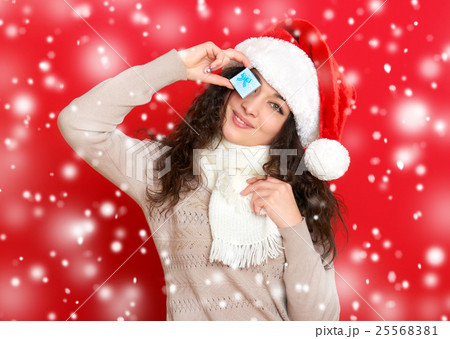 girl in santa hat portrait, new year holiday 25568381