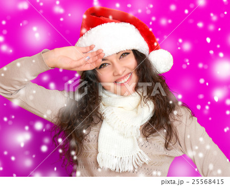 girl in santa hat portrait, new year holiday 25568415