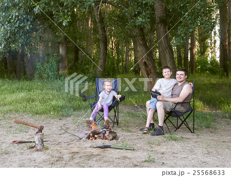 people camping in forest, family active in nature people camping in forest, family active in nature 25568633