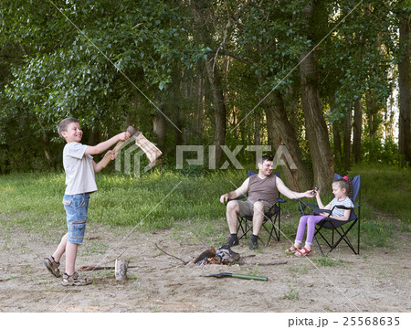 people camping in forest, family active in nature people camping in forest, family active in nature 25568635