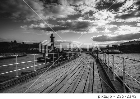Black and white image of Whitby pier 25572345