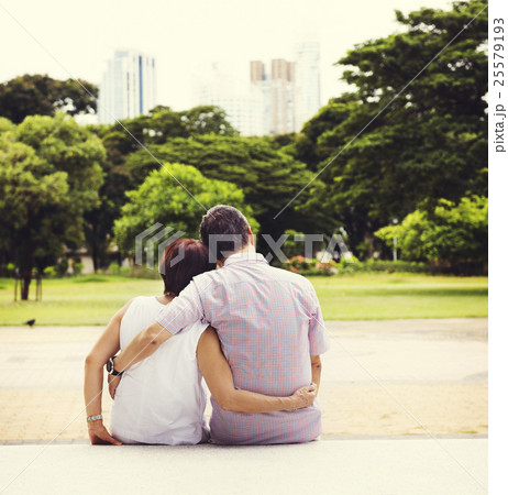 Couple Sitting Hug Park Happiness Concept Couple Sitting Hug Park Happiness Concept 25579193