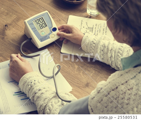 Senior Adult Measure Blood Pressure Healthcare Concept Senior Adult Measure Blood Pressure Healthcare Concept 25580531