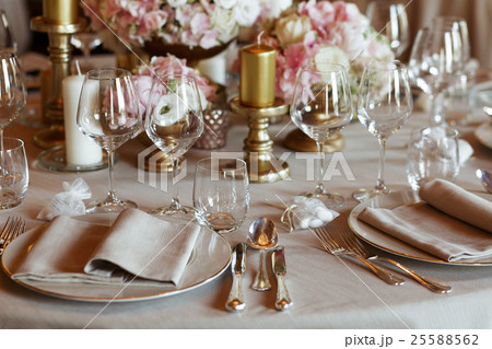 Sparkling glassware stands on the table  25588562